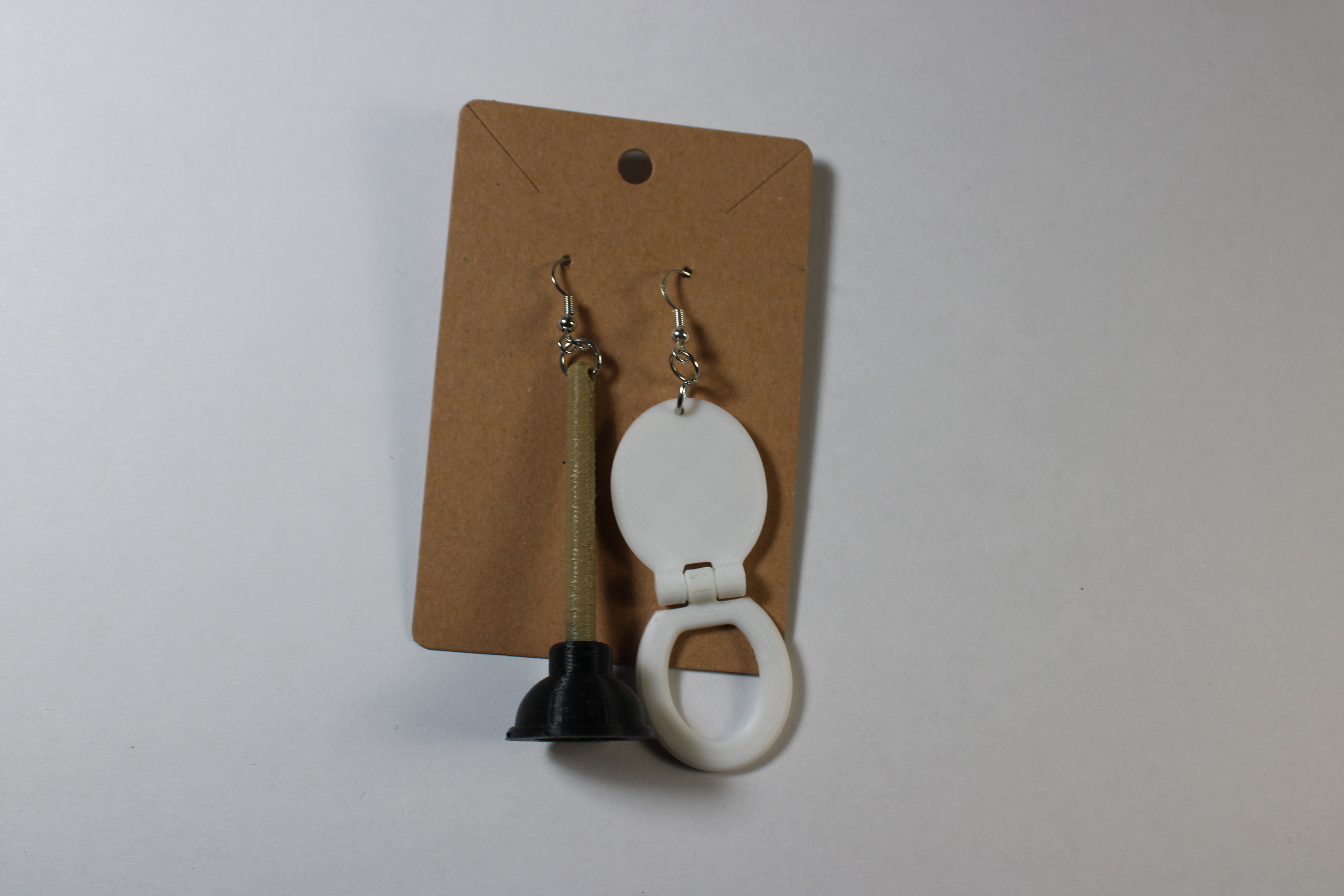 White Toilet Seat with Plunger Earrings