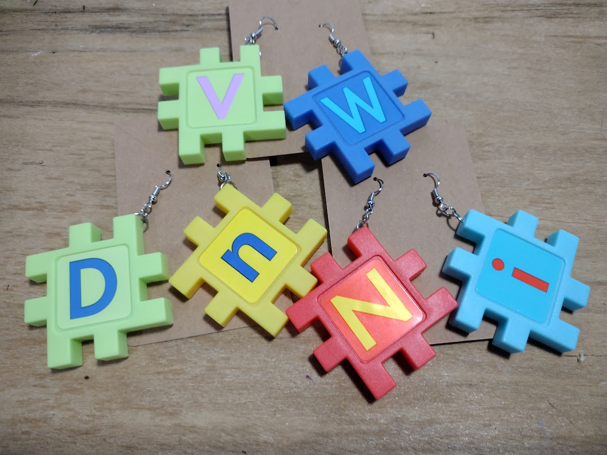 Upcycled Letter Earrings on display cards