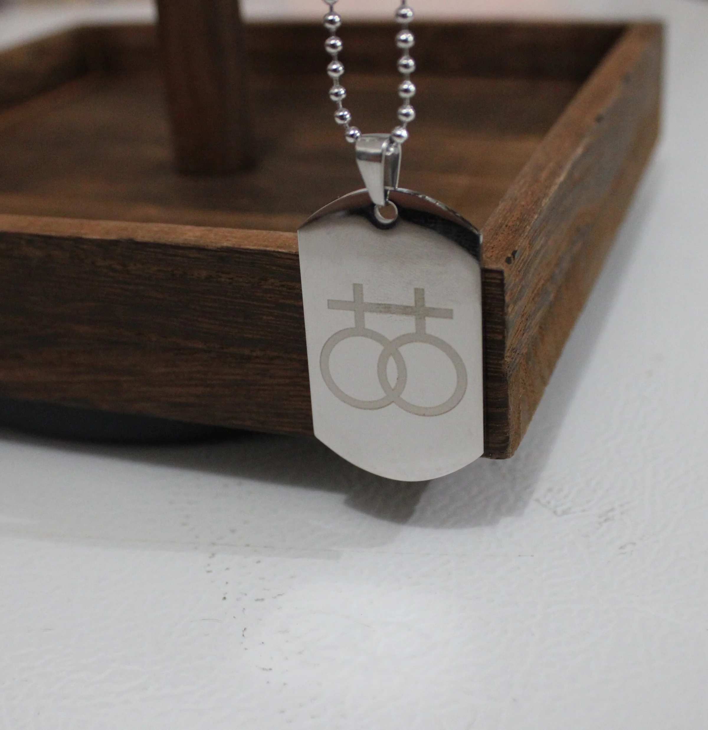 Double Venus Dog Tag (Lesbian) Showing that it was printed upside down