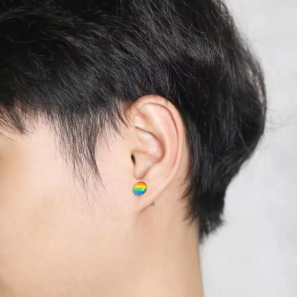 man wearing Titanium Steel Rainbow Stud Earrings, Screw Back